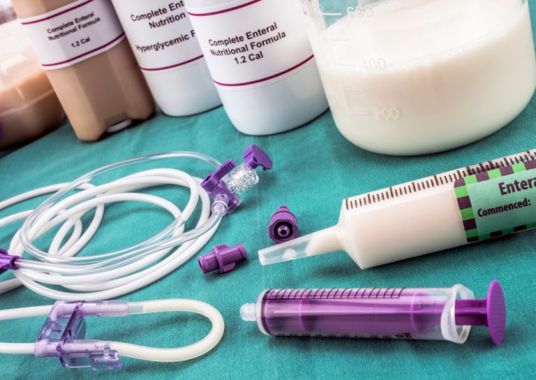 Team of enteral nutrition prepared in hospital, palliative care, conceptual image, horizontal composition